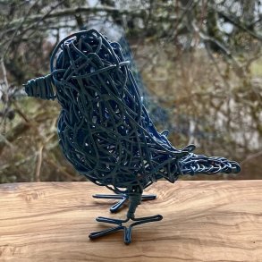 Lys bl� spurvelurv