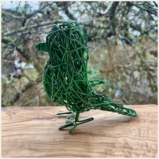 Lysegr�nn spurvelurv